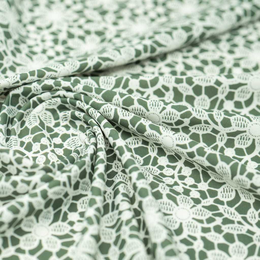 White Flower Lace Pattern on Sage Printed Spandex Fabric | CDW