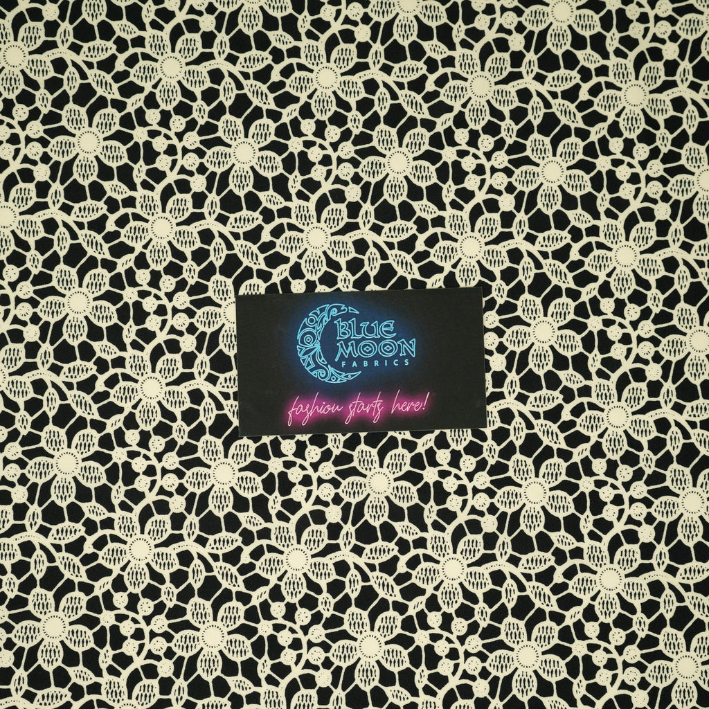 white Flower Lace Pattern on Black Printed Spandex Fabric | CDW