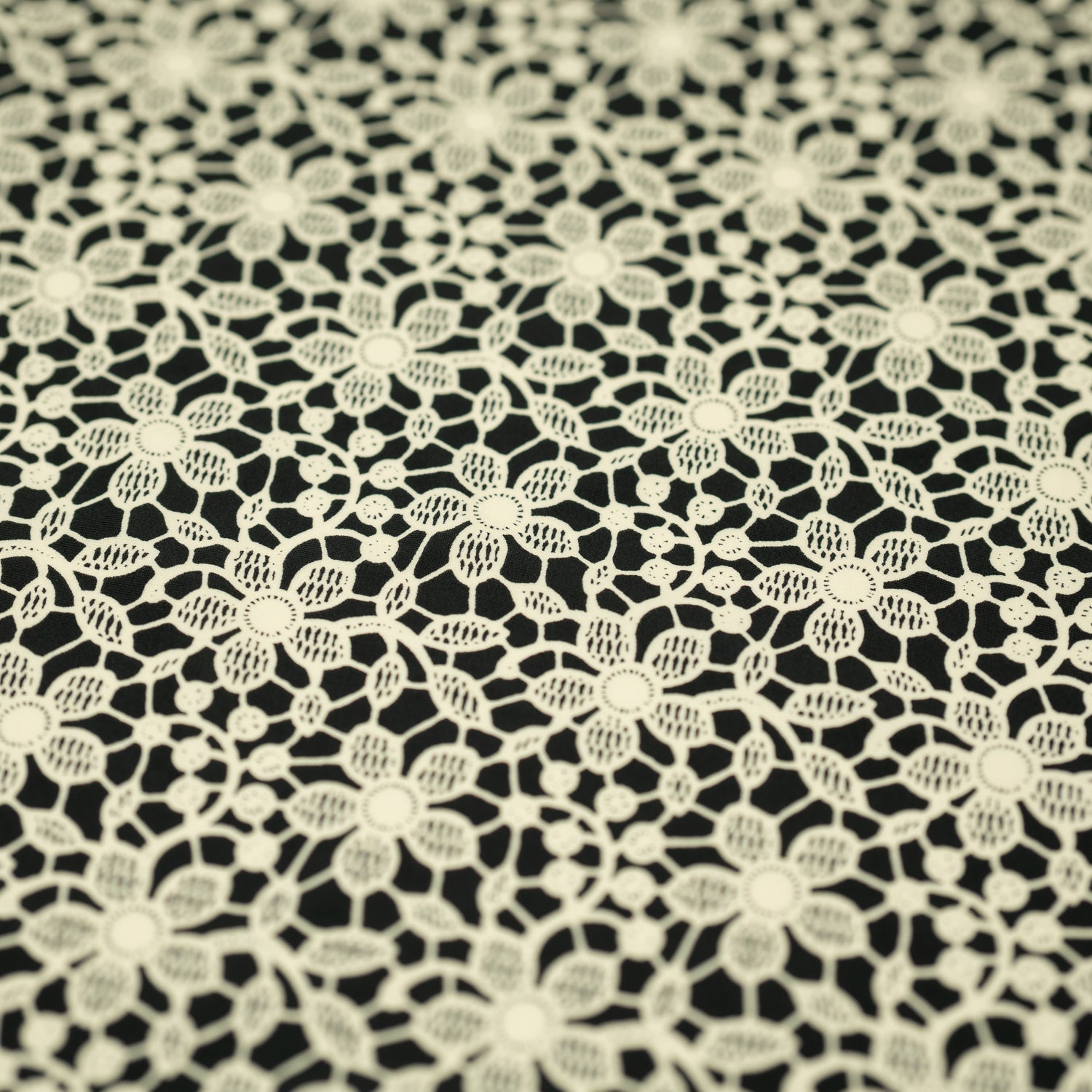 white Flower Lace Pattern on Black Printed Spandex Fabric | CDW