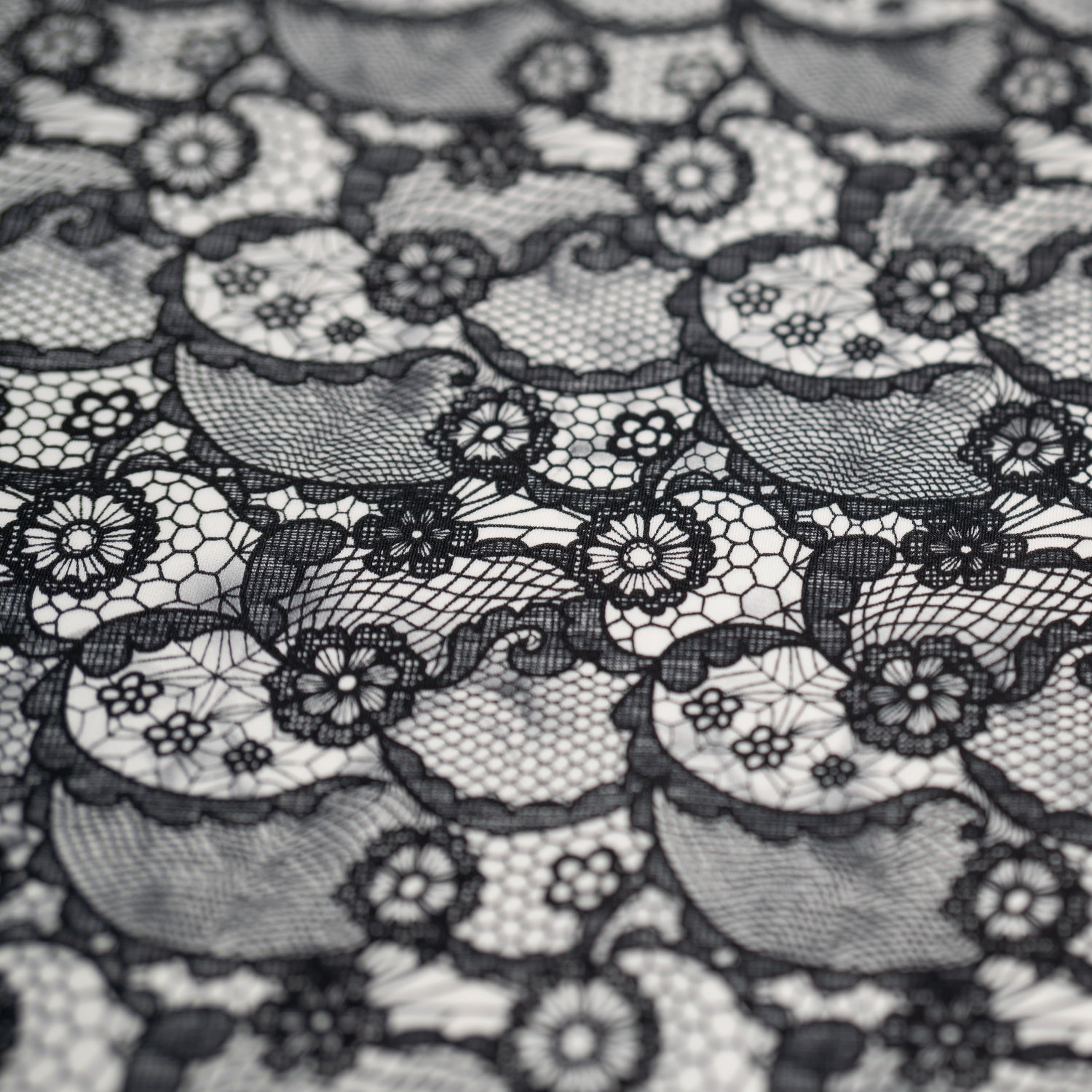 Black Paisley Lace Pattern on White Printed Spandex Fabric | CDW